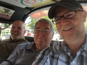 With Jim Randall and Ron Bouvier, riding in a Tuk Tuk in Thailand